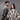 Ruana carranguera cuello en V gris y a cuadros, pareja en estudio.